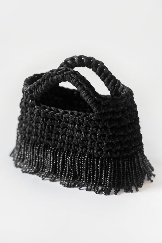 Luce nero con frange corte