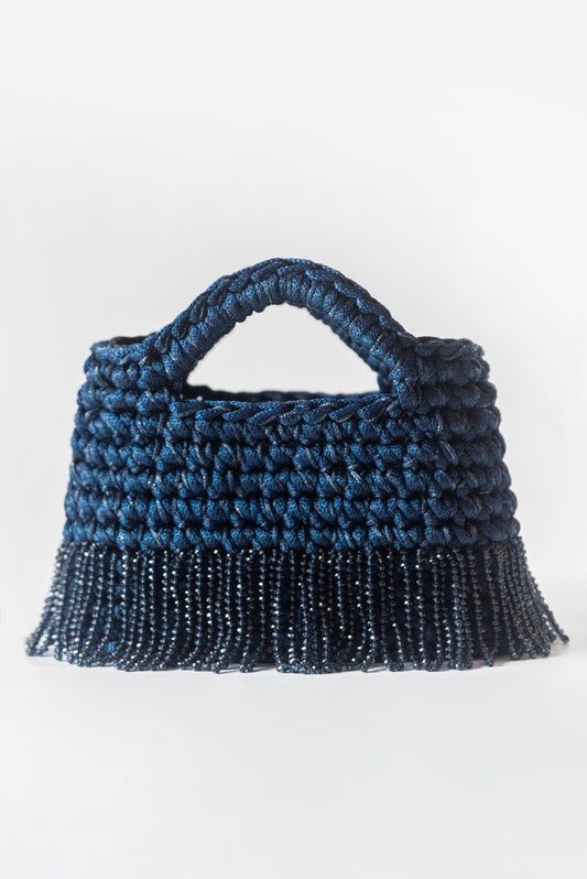 Luce blu scuro con frange corte